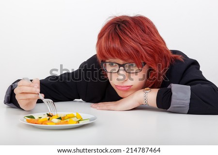 Women do not like their vegetable salad Royalty-Free Stock Photo #214787464