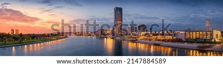 Panoramic night view of Belgrade Waterfront, river Sava, Belgrade Tower, New and Old Belgrade Royalty-Free Stock Photo #2147884589