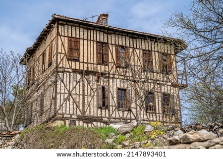 Traditional ottoman house in Safranbolu.historical stone stairs and old ottoman mansion. Safranbolu UNESCO World Heritage Site. Old wooden mansion. Ottoman architecture Royalty-Free Stock Photo #2147893401