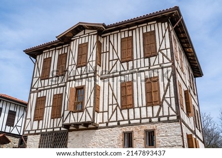 Traditional ottoman house in Safranbolu.historical stone stairs and old ottoman mansion. Safranbolu UNESCO World Heritage Site. Old wooden mansion. Ottoman architecture Royalty-Free Stock Photo #2147893437