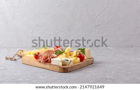 Appetizers table with differents antipasti, charcuterie, snacks and cheese. Buffet party. Top view, copy space, negative space
 Royalty-Free Stock Photo #2147921649