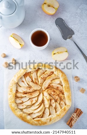 Apple galette on a paper sheet. toning. selective focus