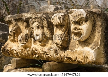 Stone Theater masks in Myra Ancient City. Demre, Antalya, Turkey Royalty-Free Stock Photo #2147947821