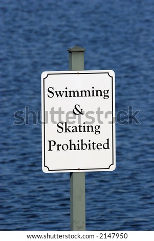 Sign prohibiting swimming and skating