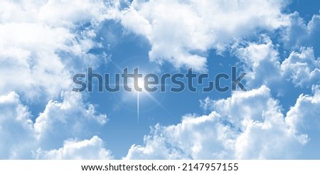 The sun shining through the puffy clouds. 3d stretch ceiling decoration image. Sky bottom up view. Beautiful sunny sky. Royalty-Free Stock Photo #2147957155