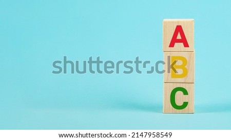 ABC on wooden blocks. ABC letters alphabet on wooden cube blocks