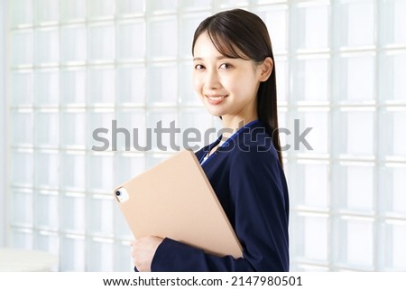Young woman in a suit Royalty-Free Stock Photo #2147980501