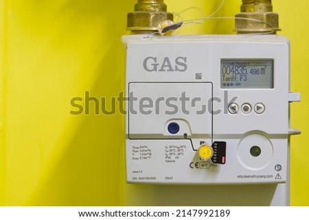 Electric gas meter display panel. Domestic smart meter installed. Concept for energy supplier and price rise. Royalty-Free Stock Photo #2147992189