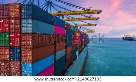 Container ship unloading crane ship seaport, Global business logistic import export freight shipping transportation worldwide container ship, Container vessel loading cargo cargo freight ship. Royalty-Free Stock Photo #2148027103