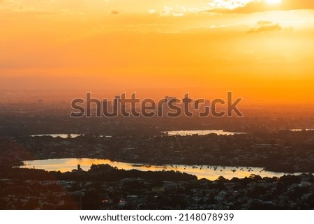 Rhodes skyline under the orange sunset light, Sydney, Australia.