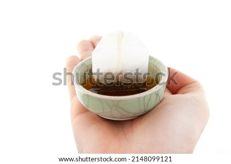 image of tea cup hand white background 