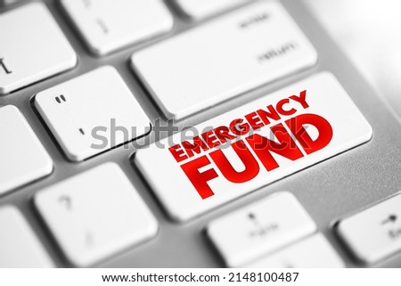Emergency fund - personal budget set aside as a financial safety net for future mishaps or unexpected expenses, text button on keyboard Royalty-Free Stock Photo #2148100487