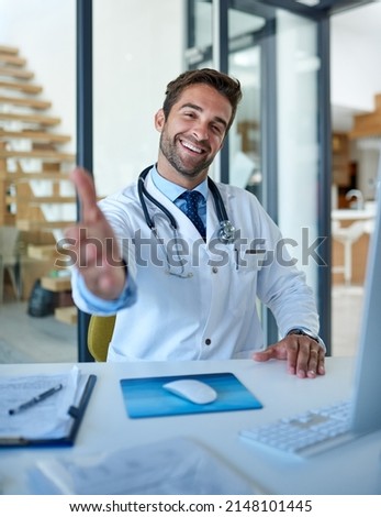 Have a seat and lets discuss your health. Portrait of a young doctor extending a handshake in his office.