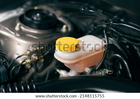Close up brake fluid tank, check brake fluid. Car maintenance concept. Royalty-Free Stock Photo #2148115755