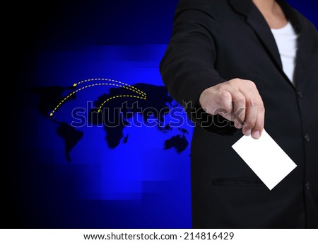 Businessman  holding blank notes and world map