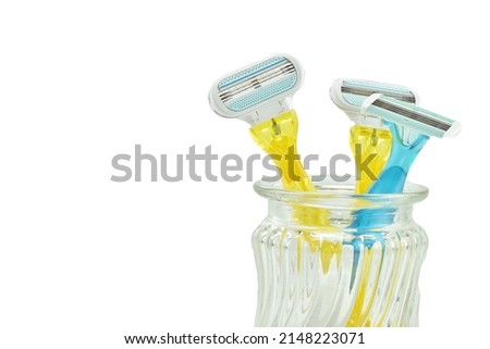 Colorful Disposable Razors on white Background