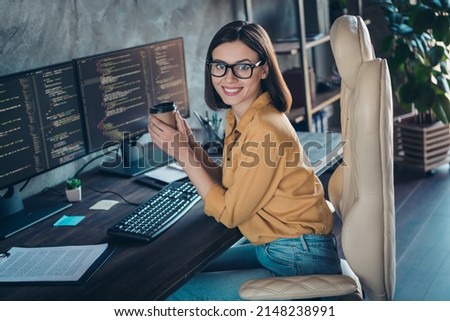 Profile side view portrait of beautiful cheerful smart clever girl geek tech solution developing web project at workplace workstation indoors Royalty-Free Stock Photo #2148238991