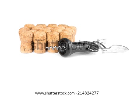 a lot of wine corks and a corkscrew on a white background