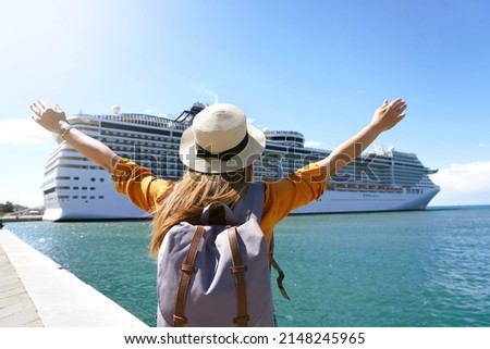 Young explorer backpacker girl dreaming to travel with cruise liner Royalty-Free Stock Photo #2148245965