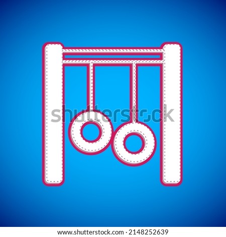 White Gymnastic rings icon isolated on blue background. Playground equipment with hanging rope with rings.  Vector