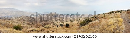 Shore of Lake Kinneret, the slopes of the Golan Heights in Israel Royalty-Free Stock Photo #2148262565