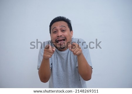 funny expression of man laughing at you