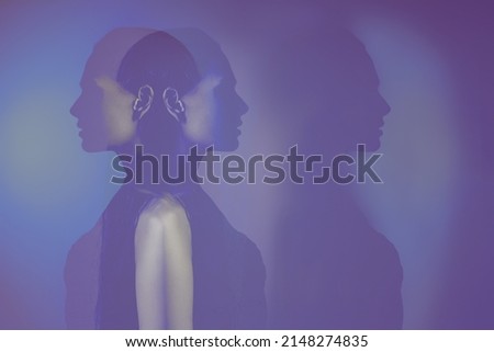 bipolar mental disorder. Double face. Split personality. Conceptual mood disorder. Dual personality concept. 2 silhouettes of a female head. mental health. Imagination. Royalty-Free Stock Photo #2148274835