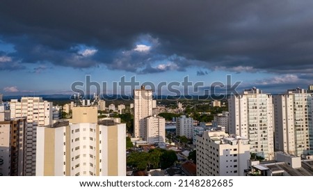 Aerial view of the city of Sao Jose dos Campos, Sao Paulo, Brazil. Residential buildings and trees on the streets.