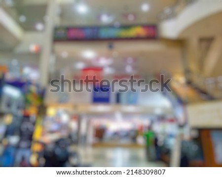abstract blur background of interior in shopping mall or shopping center. 