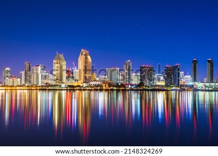 San Diego, California, USA downtown skyline on the San Diego Bay at night.