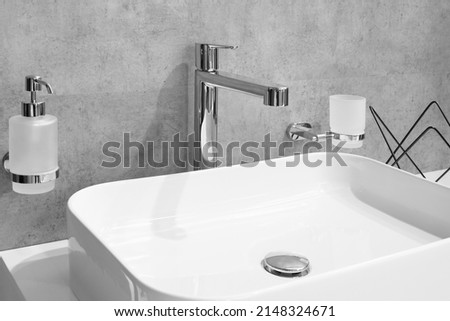 Bathroom interior with sink and faucet. Royalty-Free Stock Photo #2148324671