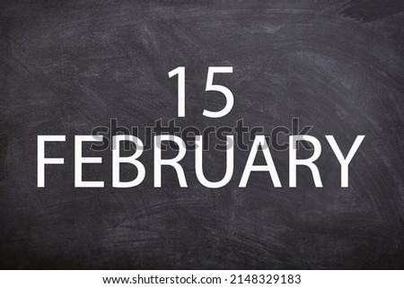 15 February text with blackboard background for calendar. And February is the second month of the year.