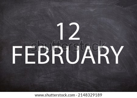 12 February text with blackboard background for calendar. And February is the second month of the year.