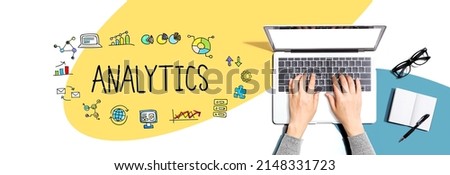 Analytics theme with person using a laptop computer
