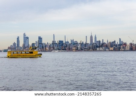 water taxi to New York. Yellow boat on Hudson river