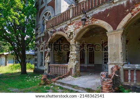 Abandoned, decaying historical heritage of the 19th century, an old ownerless estate. Background with copy space for text