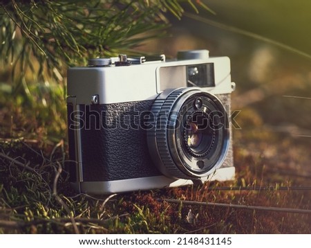 Vintage rangefinder film camera in natural outdoor