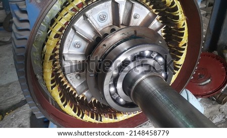 Rotor shaft and bearing for electric motor , Overhaul electric motor and change new bearing for electric motor onsite service Royalty-Free Stock Photo #2148458779