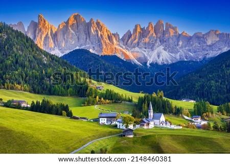 Val di Funes, Italy - Sunset Odle Ridge idyllic Dolomites mountains in  South Tyrol, Italian Alps at autumn colors Royalty-Free Stock Photo #2148460381