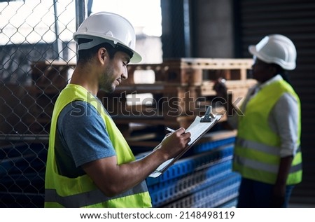 First I see it, then I solve it. Shot of a young builder inspecting a construction site. Royalty-Free Stock Photo #2148498119