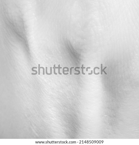 Lines. Back of the hand. Detailed texture of human skin. Close up part of female hand. Skincare, bodycare, healthcare, cosmetics, medicine concept. Design for abstract artwork, picture, poster