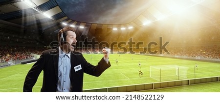 Emotional man, professional sport commentator, pressman during football match isolated over sport stadium background. Sport news, information. Football fans. Concept of wow emotions Royalty-Free Stock Photo #2148522129