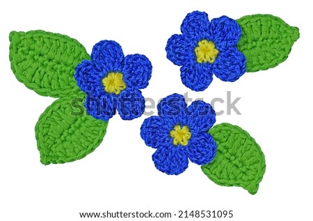 Beautiful handmade flowers and leaves isolated on a white background.
