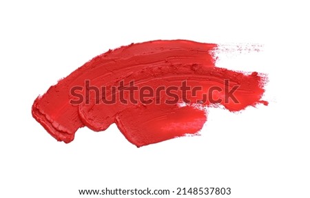 Smears of red lipstick on white background