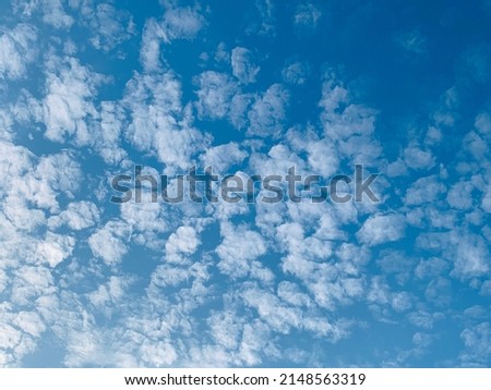 Altocumulus clouds are full of streaks white of beautiful usually appear between lower stratus clouds and higher cirrus clouds photographed over at Thailand.no focus