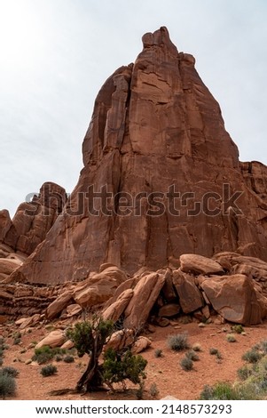 Arches National Park at Midday - Arches has many arches including the famous Delicate Arch, the Window Arch, the Double Arch and other features such as Tower of Babel, Turret Arch, and the Courthouse  Royalty-Free Stock Photo #2148573293