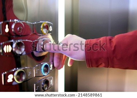 finger on the elevator tap