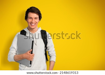 Crazy happy student with laptop computer