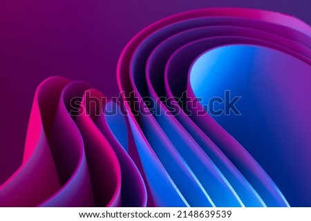 Colorful motion elements with neon led illumination. Abstract futuristic background. Royalty-Free Stock Photo #2148639539