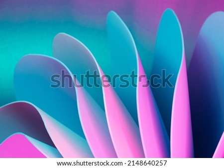 Pink and teal dynamic sheets with neon led illumination. Retro futurism abstract background
